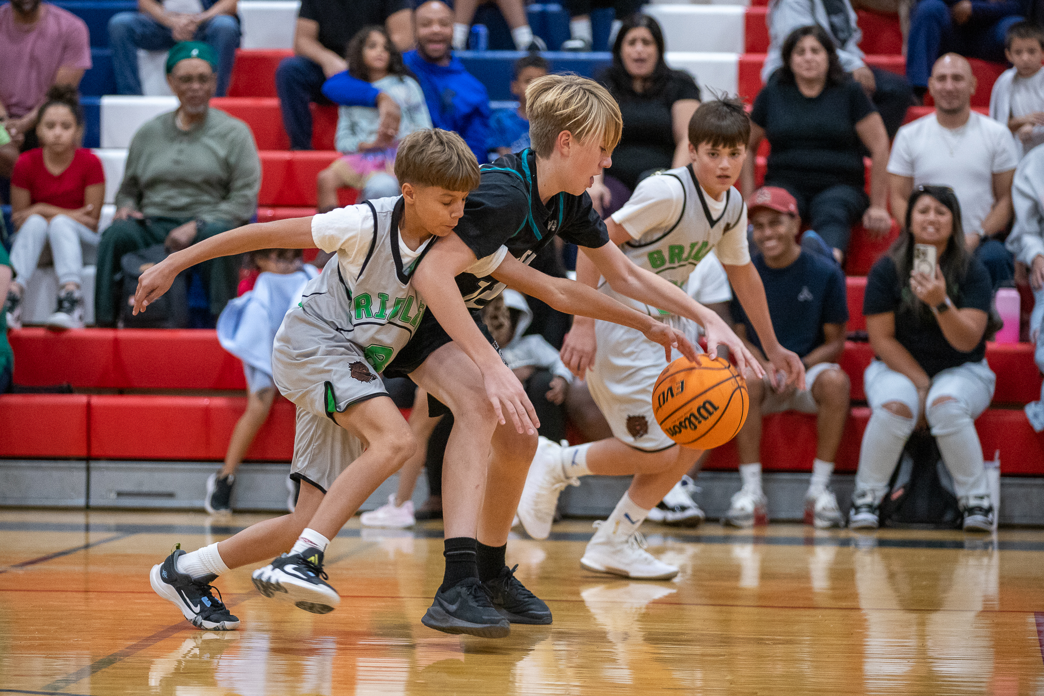 Two Gridley players chase a Dodge player down the court to get the ball