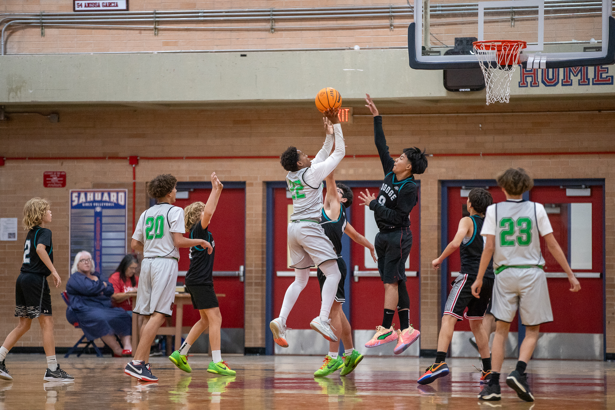 A Gridley player jumps up to shoot a basket